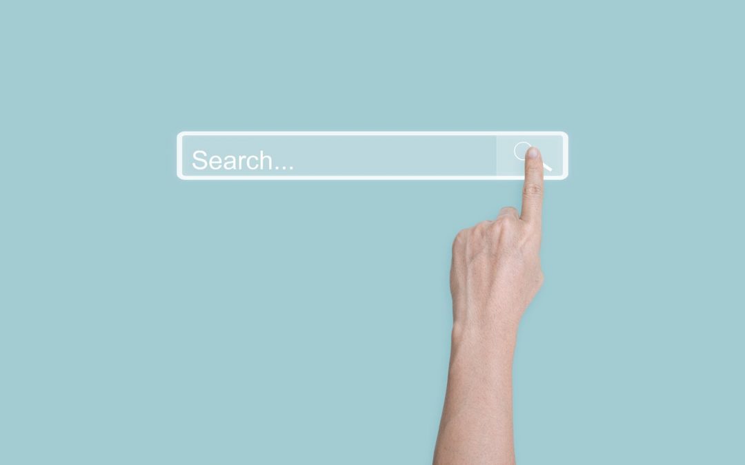 finger clicking search bar online
